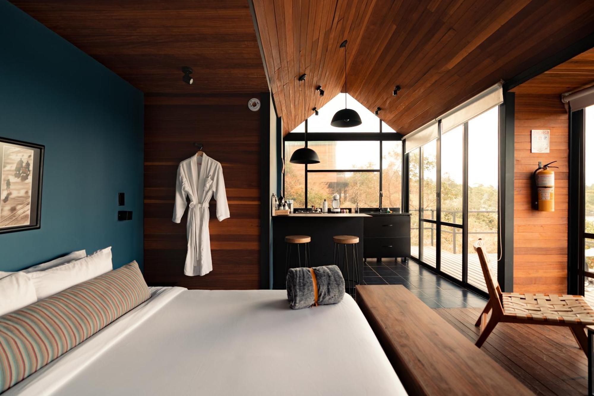The Boato Hotel Guatapé Eksteriør bilde A bedroom at the hotel
